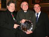 Father Arthur Neary presented with the Rochdale Man of the Year Plate