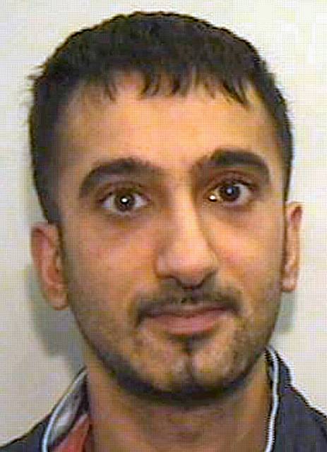 <b>Asim Rashid</b>, sentenced to four years and four months in jail. - 20081013_124758