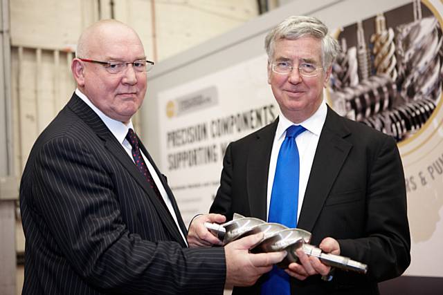 Don Whittle, HR Director of Holroyd Precision Ltd with Business Minister Michael Fallon