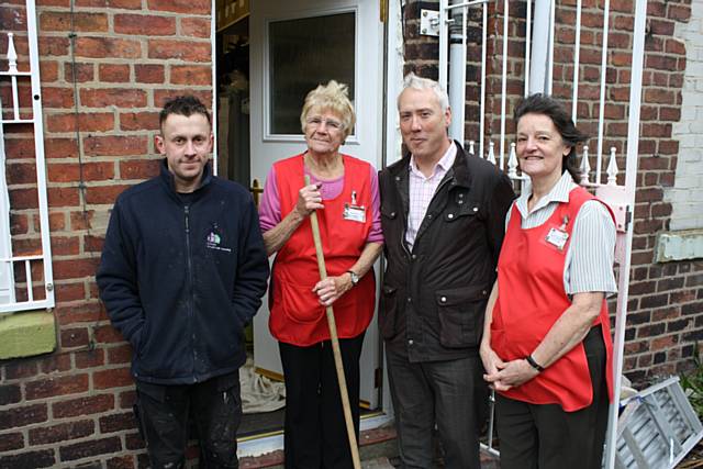 At the back of the Springhill Hospice shop in Littleborough are, from the left: RBH joiner Matt Heaney; shop volunteer Emily Ridings, RBH Planner/ Construction Design Management Co-ordinator Mark Wrigley and shop volunteer Irene Simpson