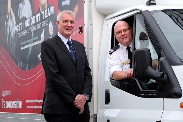 Phil Willsmer, Director of Group Risk Services, The Co-operative Group, and Wayne Shields, Head of Prevention at Greater Manchester Fire and Rescue Service, with the new PIT vehicle