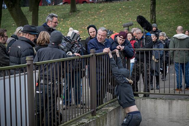 Ray Winston rehearses an action scene at College Bank

