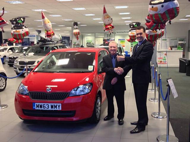 Peter Waterhouse receiving the keys to his new car from Neil Perrin, RRG Operations Director