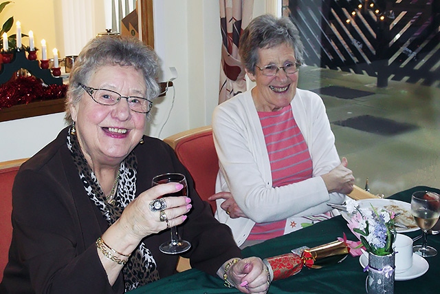 Doris Statham and Ann Flynn enjoying Brackenhall Court Christmas luncheon