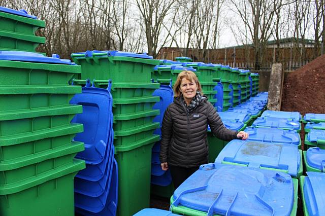 Councillor Jacqui Beswick with recycling bins