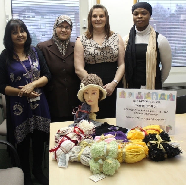 Nasreen Akhtar, RBH Engagement Officer; Suhad Sharif, Chair of Women’s Voice; Rachel Saunders, RBH Sheltered Schemes Activities Co-ordinator and Rebecca Adeleye, Women’s Voice committee member, with some of the items the group provided for worthy causes around the borough