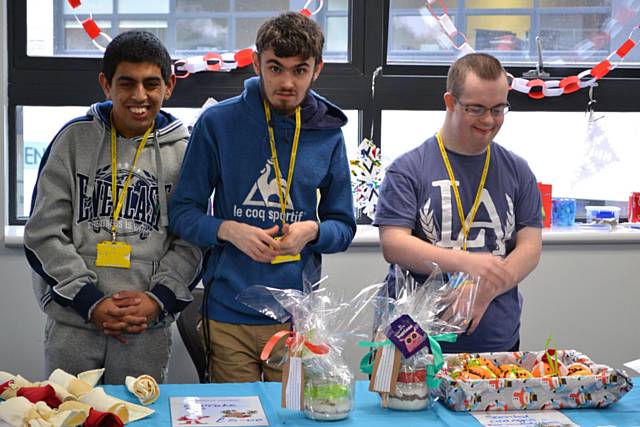 David Brooks, Brett Payne and Rizwan Mohammed manning one of the stalls at the College’s annual Christmas market