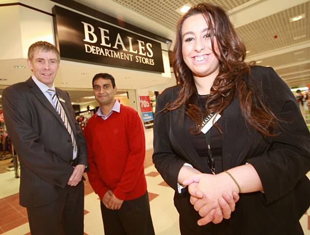 Keith Rudman, Beales Store Director, Jobcentre employee adviser Idris Ali, and Shahida Rashid