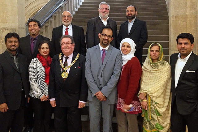 Shahbaz Hussain Khan with Mayor Peter Rush and guests