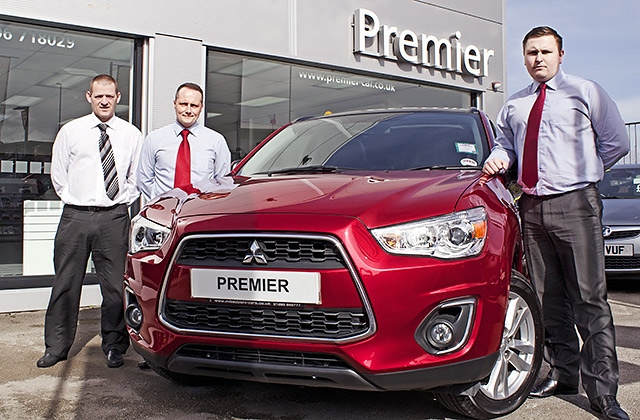 Sales Adviser Colin Mottram, Sales Manager Paul Ashcroft and General Manager Ben Bird with a Mitsubishi ASX