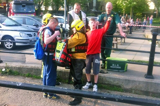 Greater Manchester Fire and Rescue Service rescue two youths stranded in the middle of Hollingworth Lake