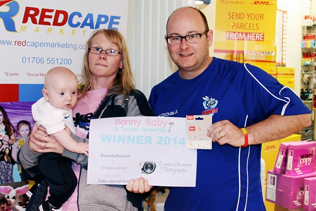 13-week-old Charlie with his Auntie Amanda Shaw and Wheatsheaf Centre Manager Martin Ballard