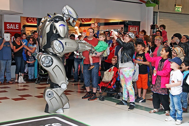 Titan interacts with the crowd in the Exchange Shopping Centre