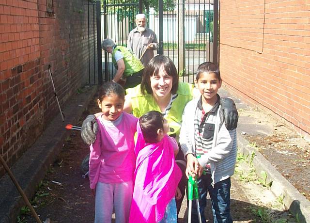 Residents of the King Street South and members of the REAG clean the back alleys