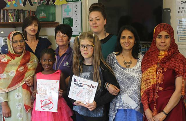 Prize winners Jussara Catila (age 8) and Teegan Smithies (age 10) with Mary Wood (RBH Freehold Manager), Jan White (RBH Caretaker), Holly Stevenson (Community Support Worker), Razia Saddiq (Playworker), Malabika Paul (Playworker) and Erum Mahmood (Freehold Community Group volunteer)