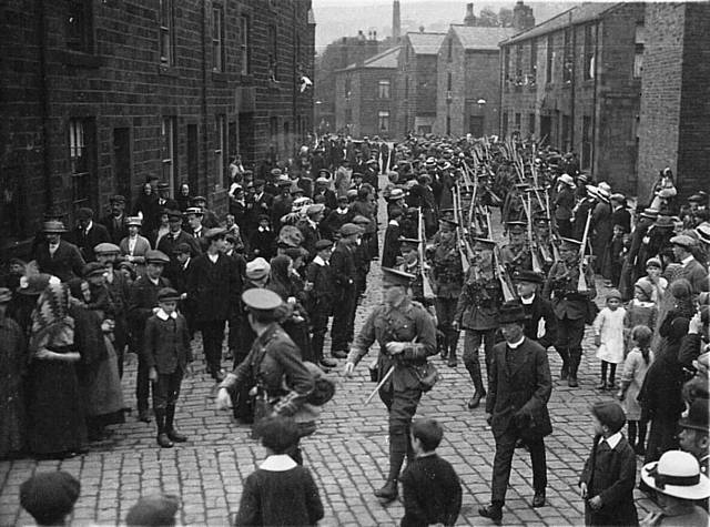 The Todmorden detachment 6th Battalion of Lancashire Fusiliers leave from the Drill Hall on Dalton Street off Stansfield Road Todmorden in 1914