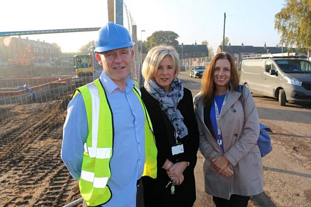 Site Manager Kevin Duffy with RBH Neighbourhood Housing Officer Lisa Halstead and Director of Communities Clare Tostevin at the site of the new homes