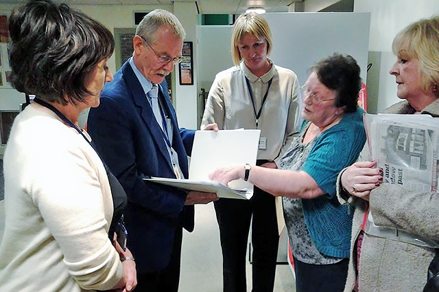 Pearl Naylor, Janet Lees and Debbie Goldrick handing the petition to NHS England representatives