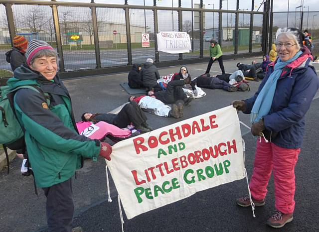 Mai Chatham and Pat Sanchez from Rochdale and Littleborough Peace Group support the blockade of the Atomic Weapons Establishment at Burghfield, near Aldermaston