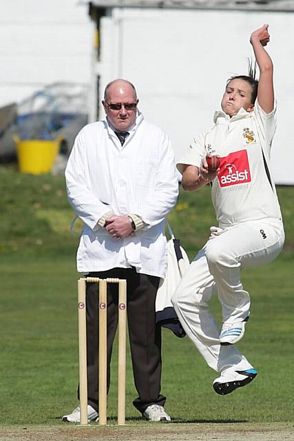 Kate Cross, with umpire for the day, David Fare