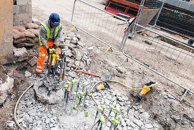 Work uncovering the River Roch