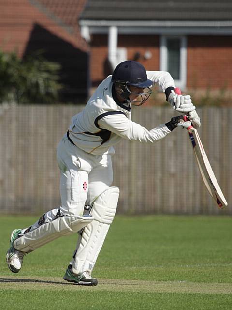 An excellent half century in the face of adversity for Liam Mason