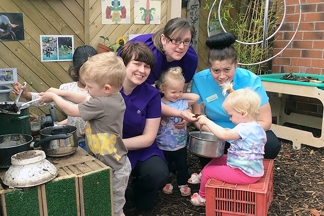 Staff and children at Little Steps Nursery