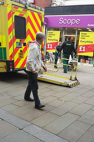 Ambulance outside the Scope charity shop where a woman had a seizure