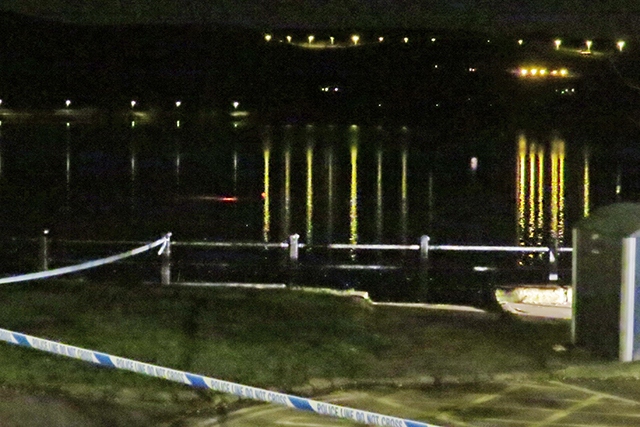 The submerged car's rear lights can be seen in Hollingworth Lake