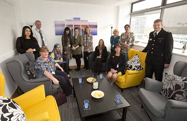 Chief Superintendent Chris Sykes joins staff from Victim Support, volunteers and police staff to launch the Birch Room 
