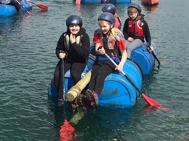 Guides from Heywood set sail on the raft they built
