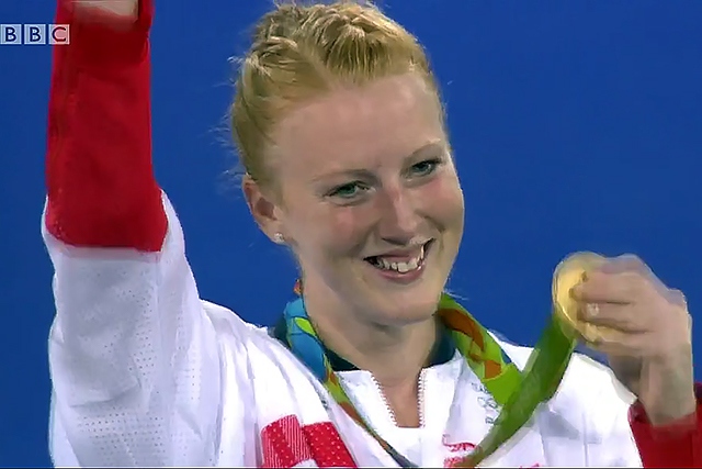 Nicola White shows her Olympic gold medal