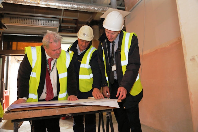 Councillor Richard Farnell, leader of Rochdale Borough Council, Chris Bell, Managing Director of H Bell and Sons, and Tony Burgess, building surveyor at Rochdale Borough Council 