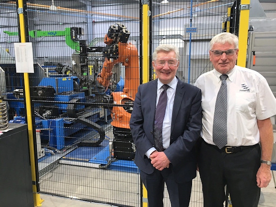 Tony Lloyd and Malcolm Hanson with the ‘million pound plus’ 
 machinery