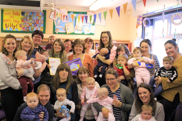 Irene celebrates with Councillor Janet Emsley, and Middleton parents and toddlers 