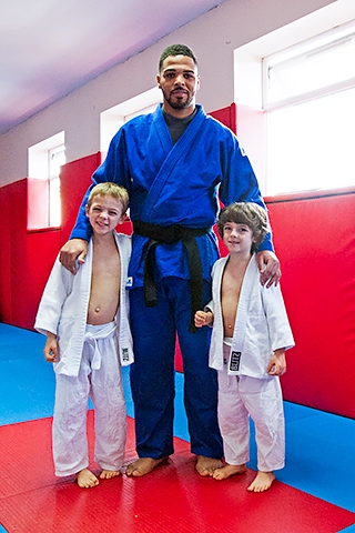 Ricardo Pina with two juniors at a Rochdale Judo Club grading