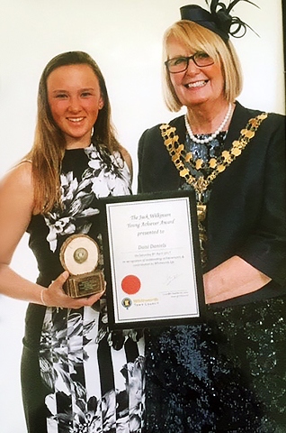 Daisi Daniels presented with her award by the Mayor of Whitworth Madeline De Souza