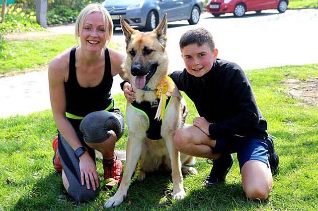 Doggy Dash for Life winners Samantha Raby, son Emerson with their dog, Mika