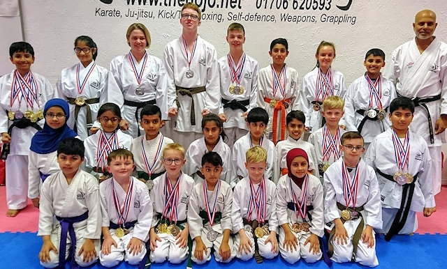 Members of The DOJO Karate Centre with their 62 Medals, 18 Golds, 24 Silvers, 20 Bronze