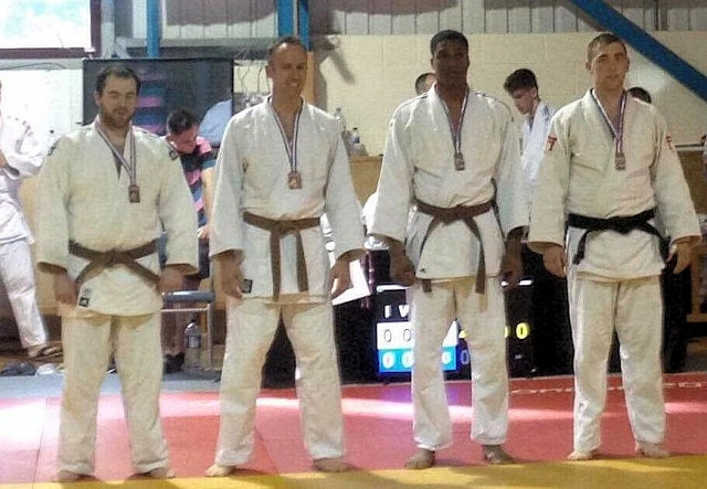 Dave Hulme (right) won three out of three contests to take Gold - Rochdale Judo Club