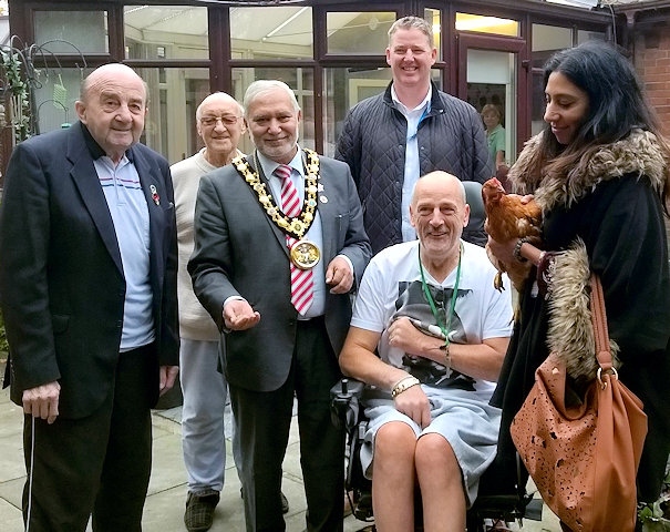 Mayor Mohammed Zaman visits Heywood Court Care Home to see their Chicken Project