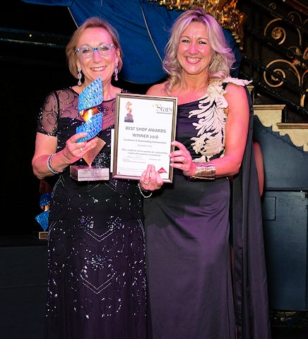 Marjorie Thompson, Chantilly, (left) with the Stars: Underlines Best Shop Award for Excellence and Outstanding Achievement
