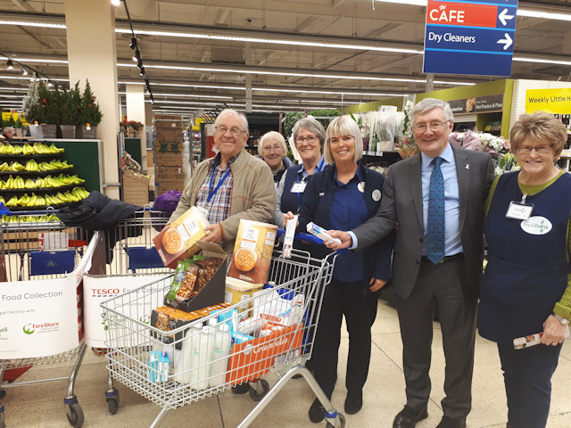 Rochdale MP Tony Lloyd with Foodbank volunteers at Tesco, Sudden