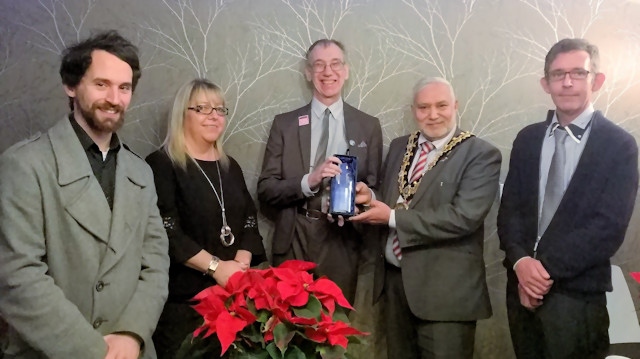 John Priestley (centre) with Mayor Zaman and staff from The Limes Housing
