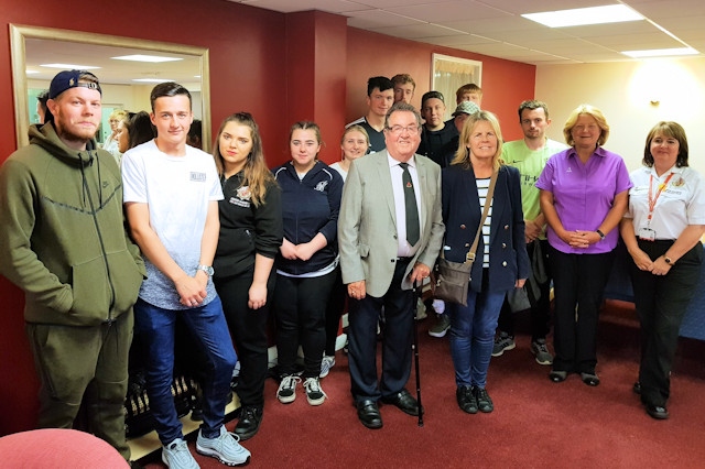Councillors Peter Rush and Jacqui Beswick (centre) with scheme manager Janet Murray and the Heywood Prince's Trust trainees