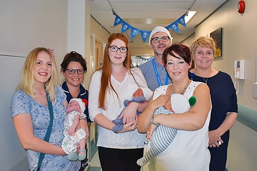 Amy Carlon with baby Freya, Mel Wildman (ward manager), Jennie Andrews with baby Teddie, Simon Mehiga (head of midwifery), Nicola Firth (director of nursing/chief officer) and Fay Read with baby Theo