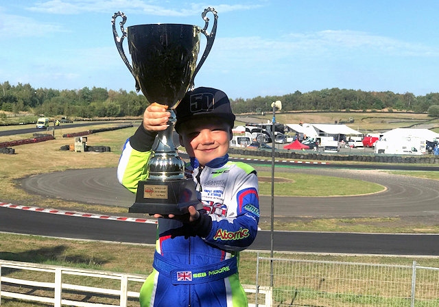Seven year old Seb Moore with the MBKC Bambino Gold Cup
