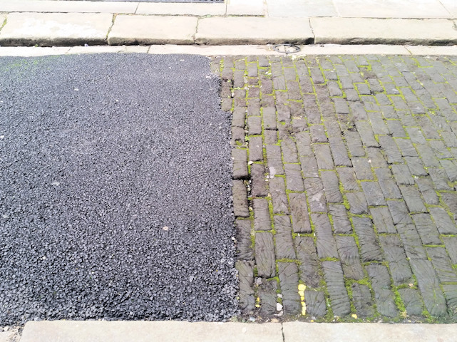 Tarmac and remaining wooden setts on King Street