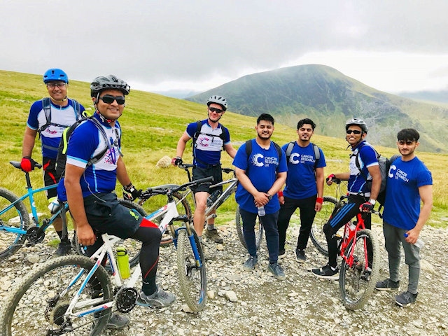 Rochdale GP cycling up Mount Snowdon for Cancer Research UK