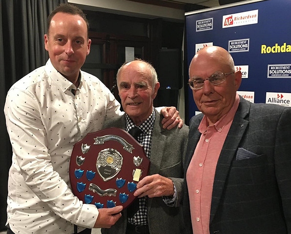 Former Rochdale captain Peter Fletcher (centre) presents the professional’s Player of the Year Shield to Steve Oddy, watched by Alistair Bolingbroke